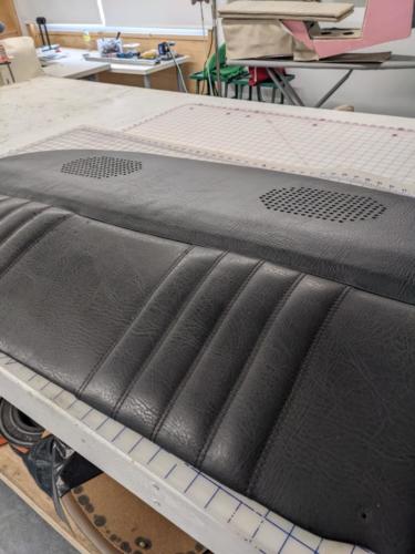 New upholstery for back speaker panel 